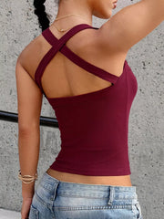 Wine red ribbed cami with crisscross back straps and square neckline.