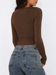 Chocolate long sleeve ruched top with adjustable side tie detail