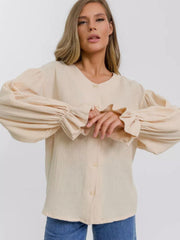 Ochre textured puff sleeve blouse with ruffled cuffs and button front