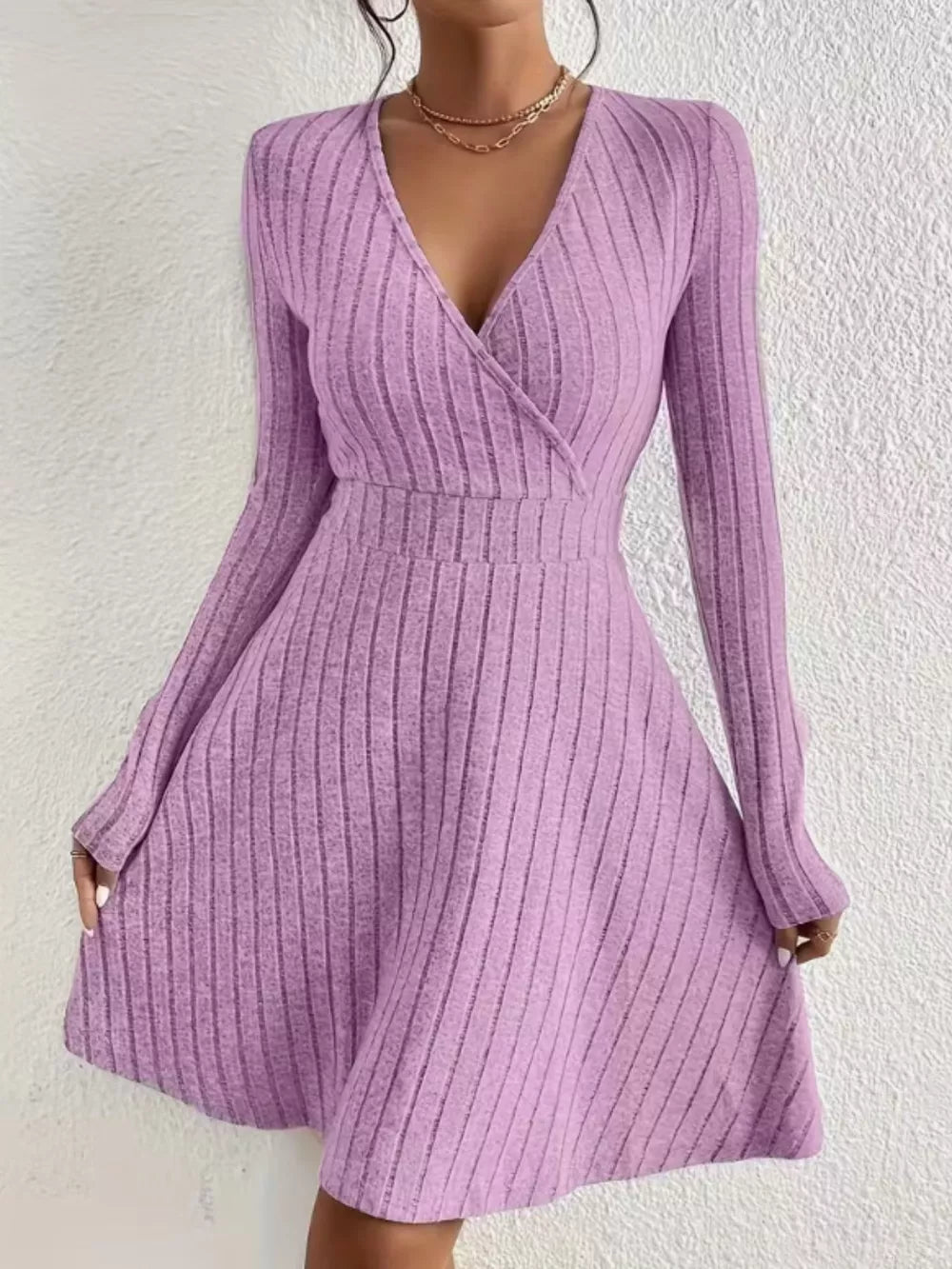 Lavender ribbed wrap mini dress with long sleeves and a V-neck.