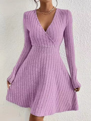 Lavender ribbed wrap mini dress with long sleeves and a V-neck.