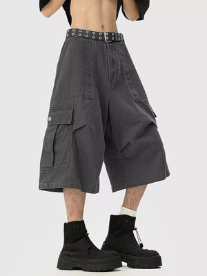 Relaxed fit dark gray cargo cropped sweatpants with multiple pockets and a belt.