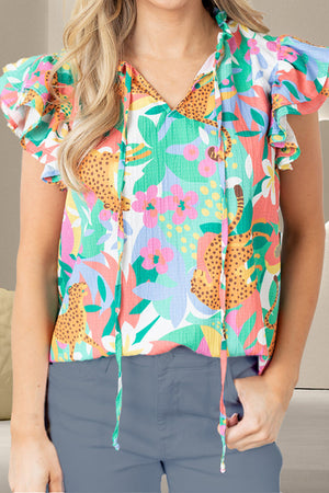 Jungle Cat Ruffle Sleeve Blouse in Neon Green with tie-neck and floral print.