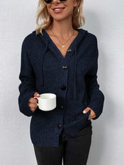 Dark blue button-front hooded knit cardigan with drawstring and black buttons.
