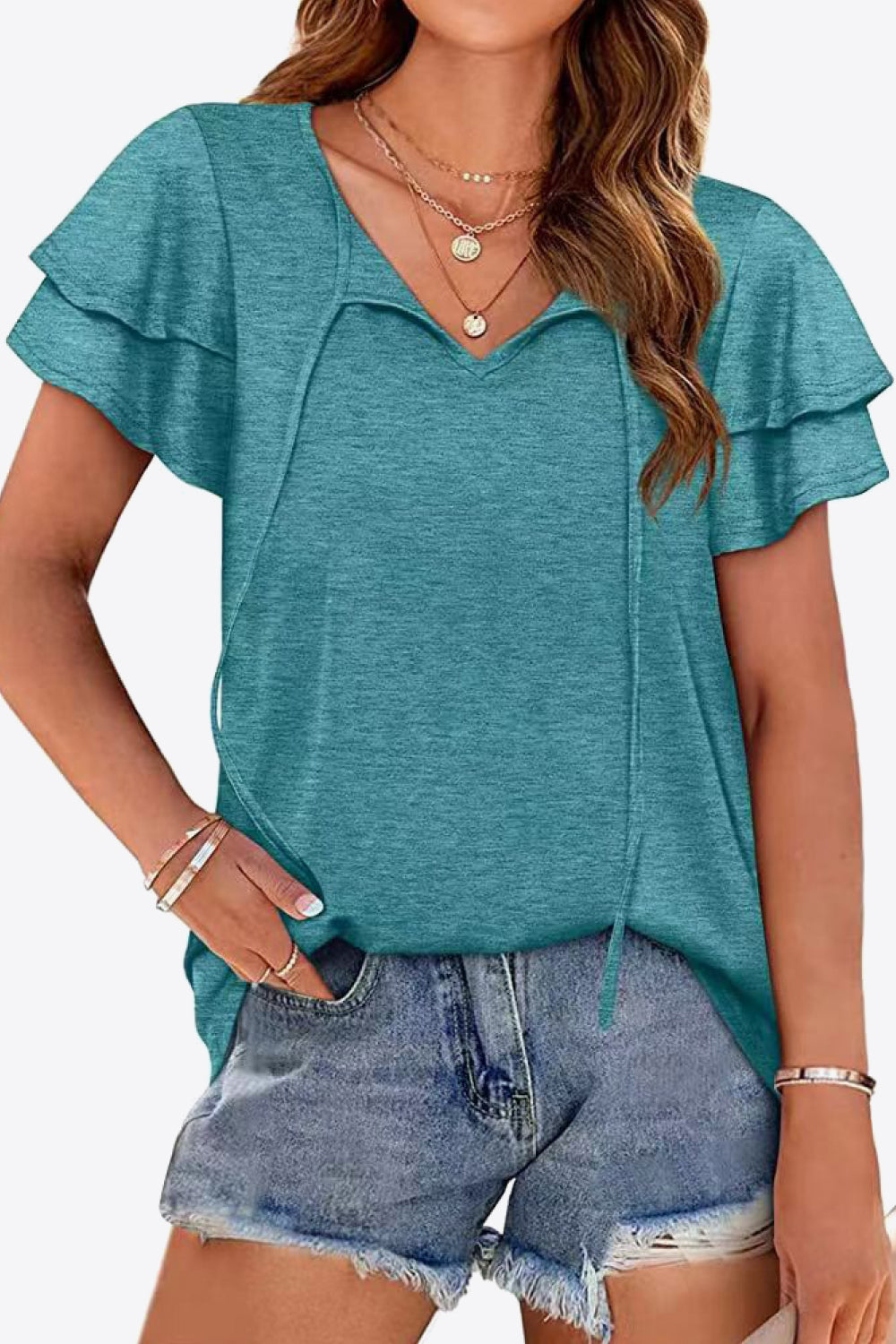 Tiered sleeve keyhole blouse in Air Force Blue with tie detail.