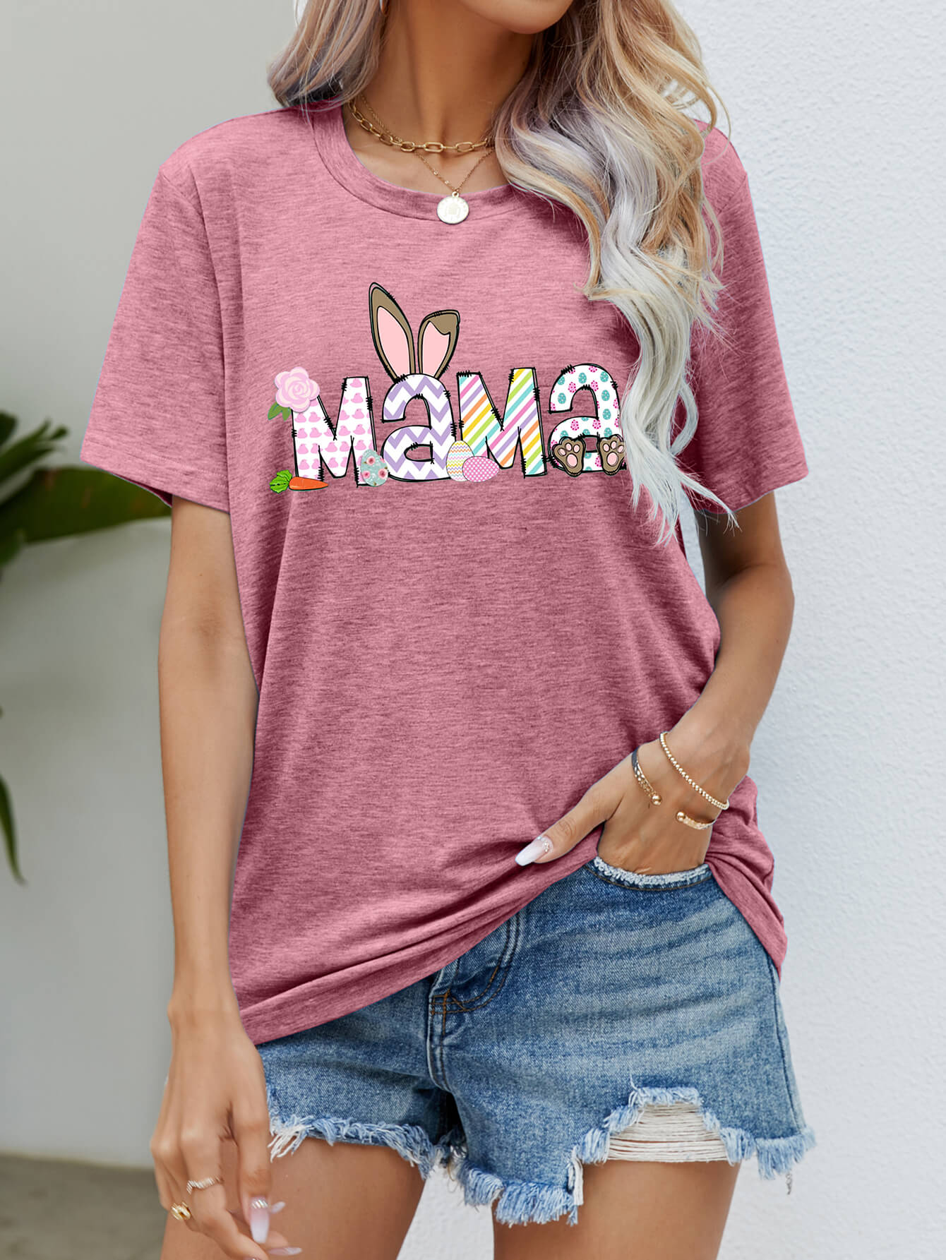 Dusty Pink Easter Mama graphic tee with bunny ears and Easter egg details.