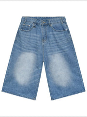 Light blue denim culottes with a wide leg and distressed detailing.