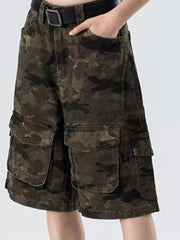Men's dark camo cotton cargo shorts with multiple pockets and a black belt.