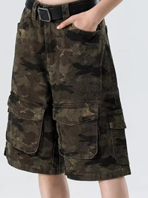 Men's dark camo cotton cargo shorts with multiple pockets and a black belt.