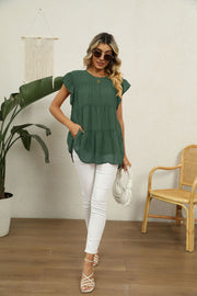 Forest green Swiss dot tiered flutter sleeve blouse with round neckline