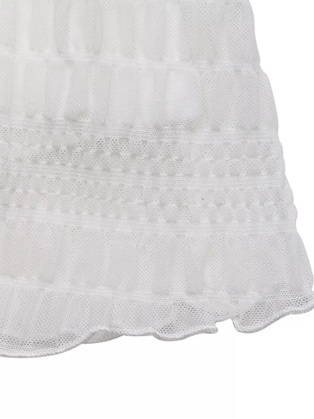 White textured smocked mesh dress with ruffled hem detail