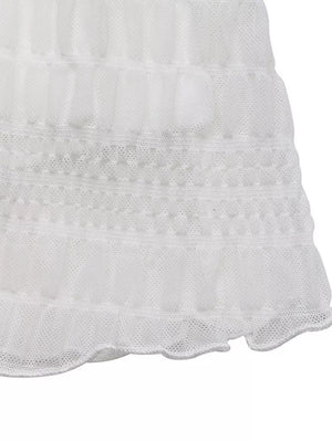 White textured smocked mesh dress with ruffled hem detail