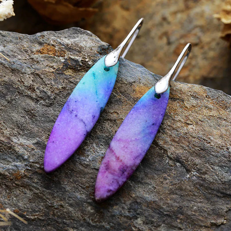 Verdant Stone Teardrop Dangle Earrings in blue/purple with silver hooks.