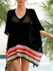 Black crochet beach cover-up with V-neck and rainbow stripe hem detail.