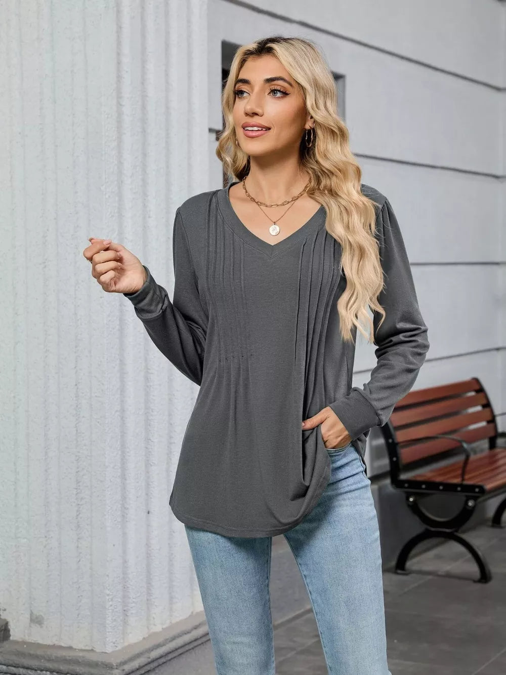 Dark gray V-neck long sleeve maternity t-shirt with pleated detail and relaxed fit.