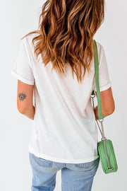 White casual tee with cuffed sleeves and a graphic tattoo detail on the arm.
