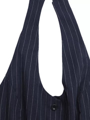 Navy pinstripe halter jumpsuit with decorative button detail