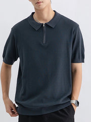 Textured knit zip-up polo shirt in dark gray with short sleeves and a spread collar.