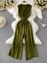 Green V-neck wide leg jumpsuit with belt and button details