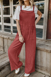 Rust textured cotton overalls with square pockets and wide legs