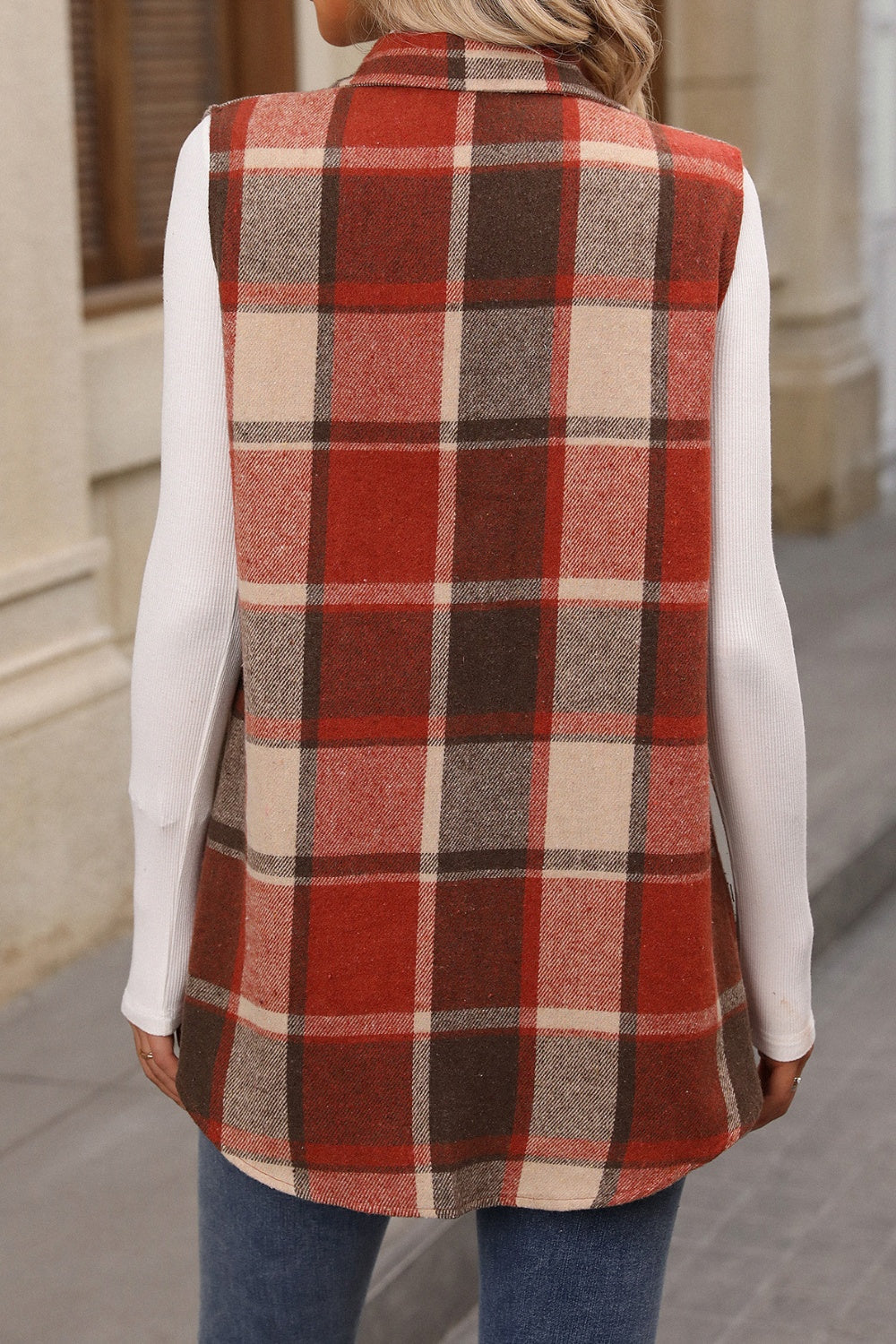Plaid utility vest in Terracotta with patch pockets, button front, and collared neckline.