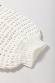 White crochet knit pullover sweater with ribbed cuffs and graphic stripe detail.