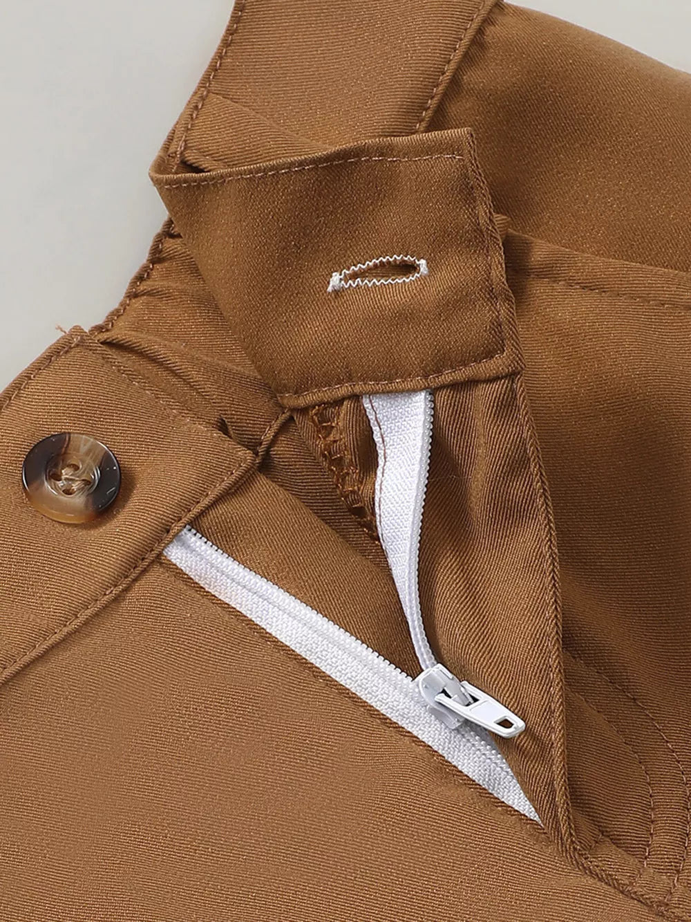 Brown baby pants with button and zipper closure detail