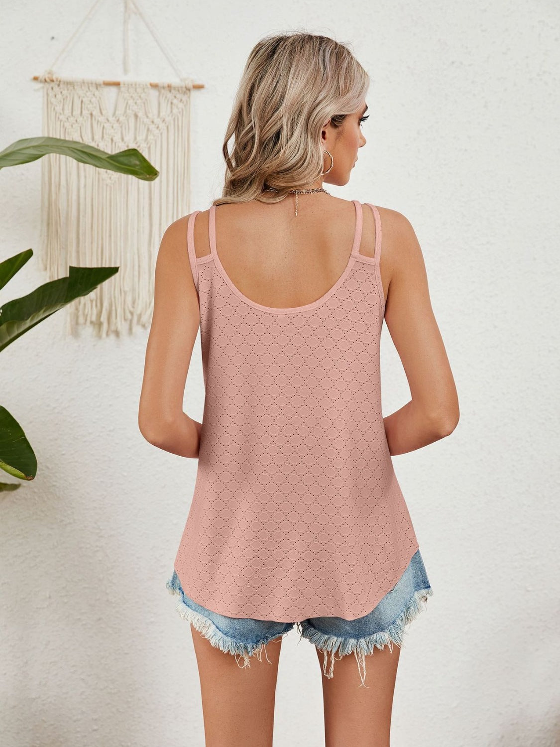 Dusty Pink eyelet overlay strappy V-neck tank top with a curved hem.
