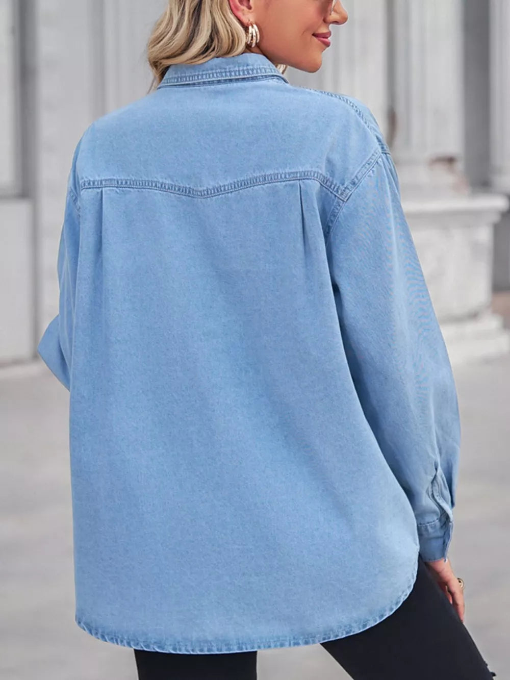 Light blue washed denim maternity overshirt with classic collar and curved hem.