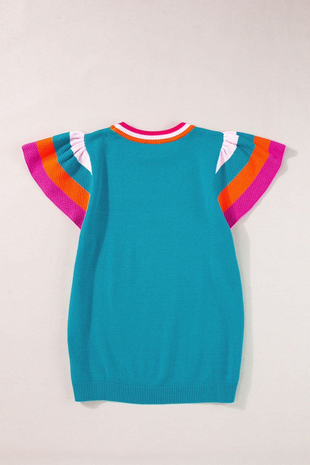 Cerulean knit blouse with flutter sleeves and colorblock trim in pink, orange, and white.