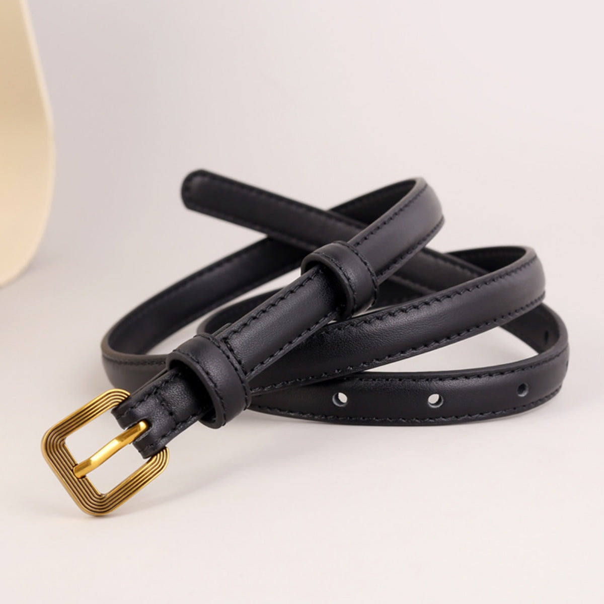 Black cowhide leather skinny belt with antique brass buckle
