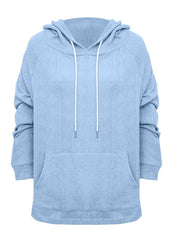 Light blue textured knit raglan hoodie with white drawstring and front pocket.
