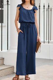 Dark Blue Textured Ruffle-Sleeve Drawstring Palazzo Jumpsuit with wide legs and pockets.