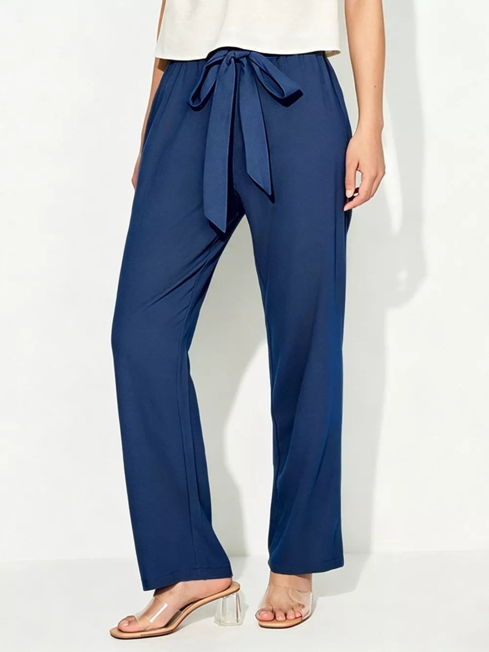 Blue maternity pants with adjustable tie detail and wide legs.
