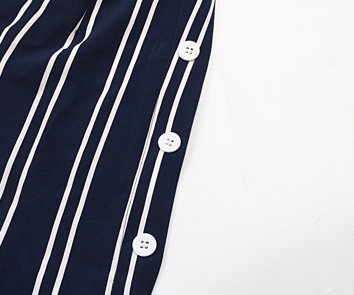 Dark blue vertical stripe palazzo trousers with white button detail