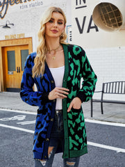 Colorblock leopard knit duster cardigan with button front and pockets.
