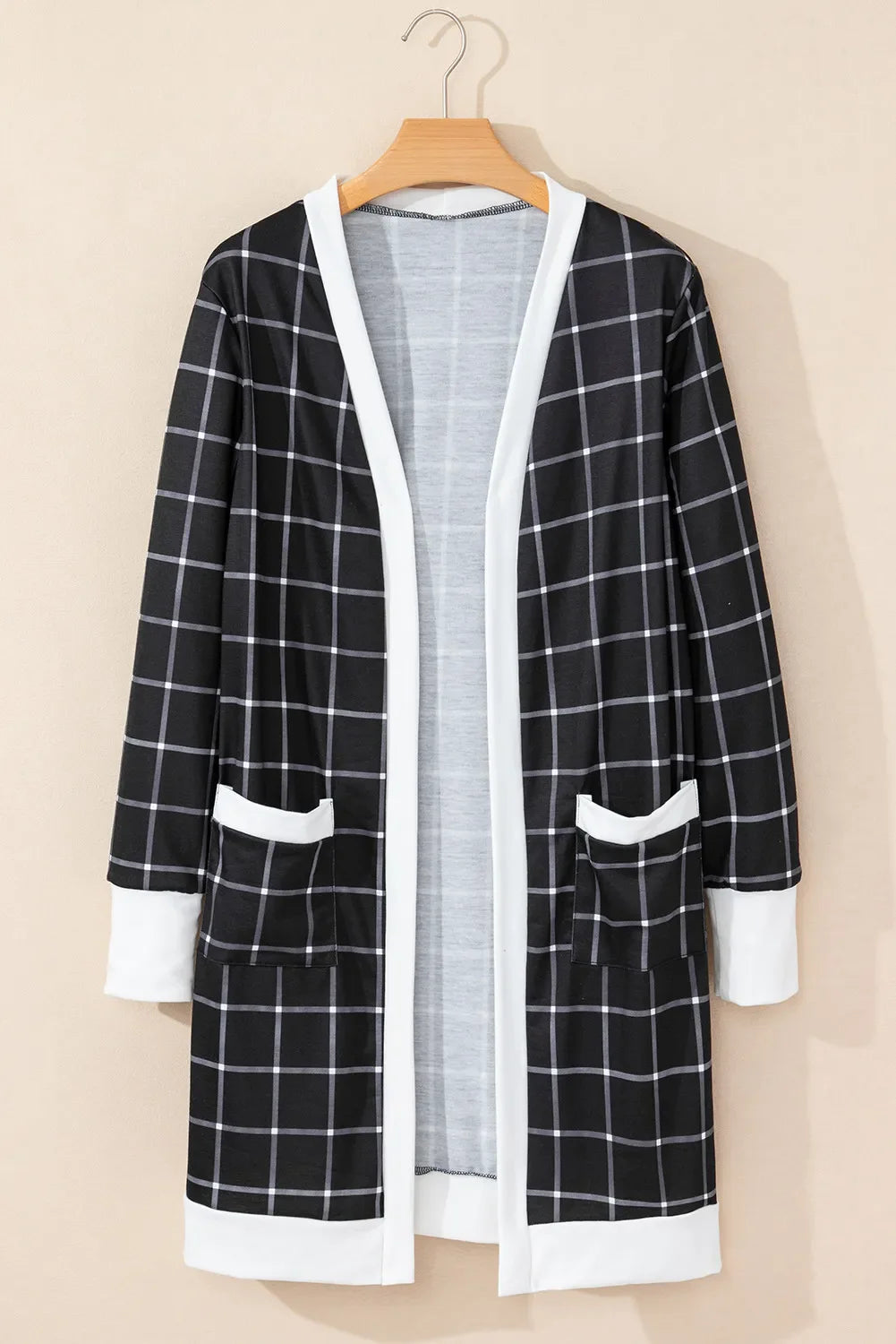 Black plaid duster cardigan with white trim and pockets