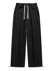 Black lightweight wide-leg sweatpants with white drawstring and adjustable hem.