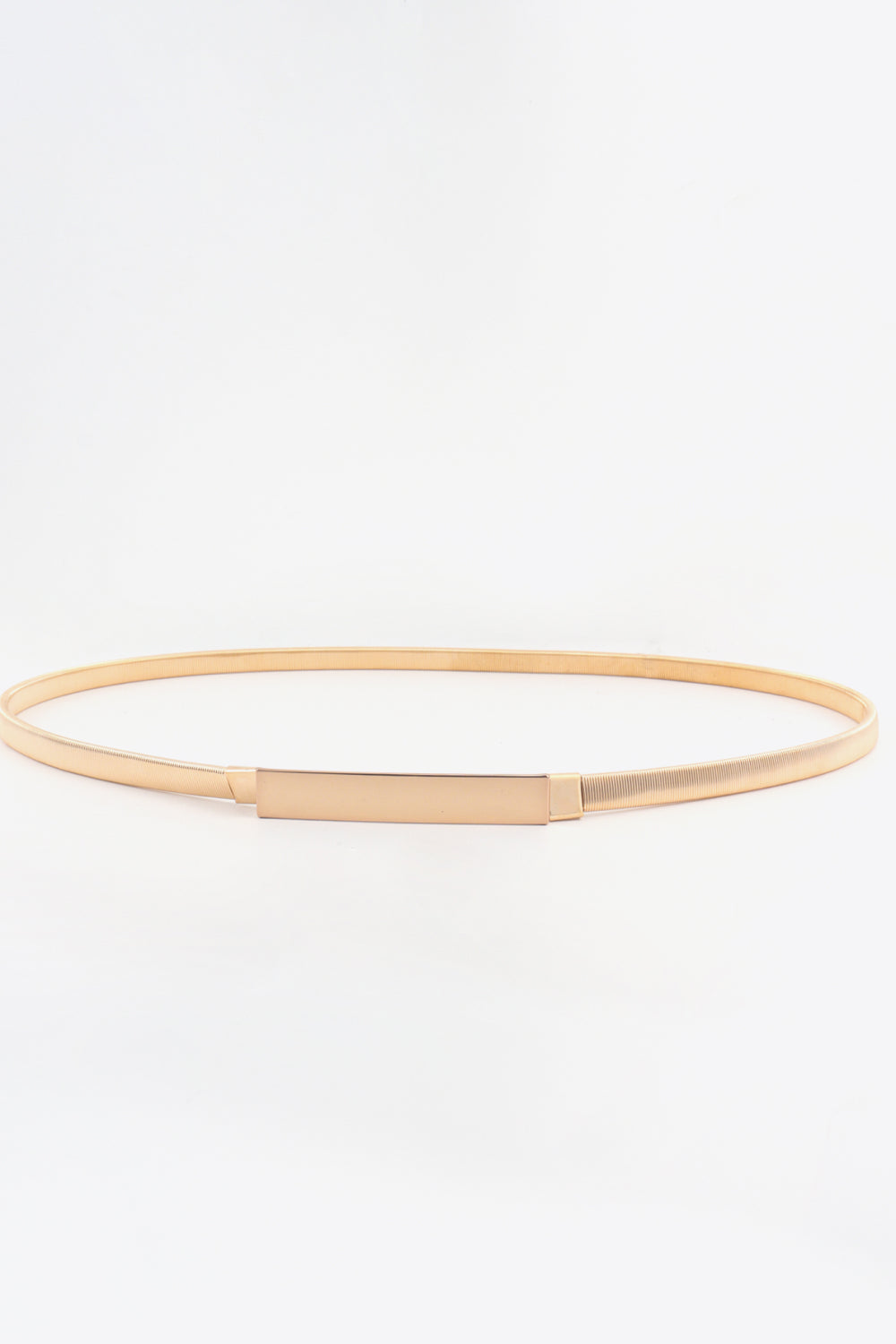 Slimline gold-tone metal waist belt with a rectangular buckle and adjustable elastic band.