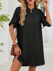 Black button-down shirt dress with band collar and roll-tab sleeves.