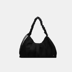 Black ruched handle crescent shoulder bag with braided strap detail