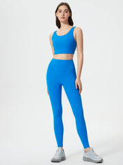 Blue sculpted contour leggings with pocket detail, full length.