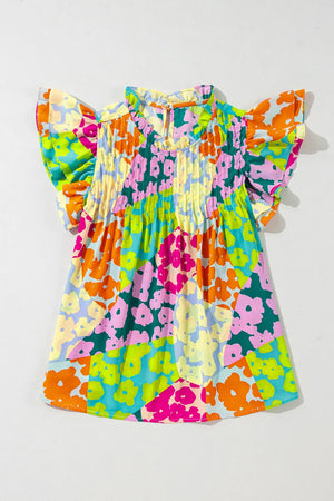 Floral ruffle yoke blouse with flutter sleeves and smocked bodice