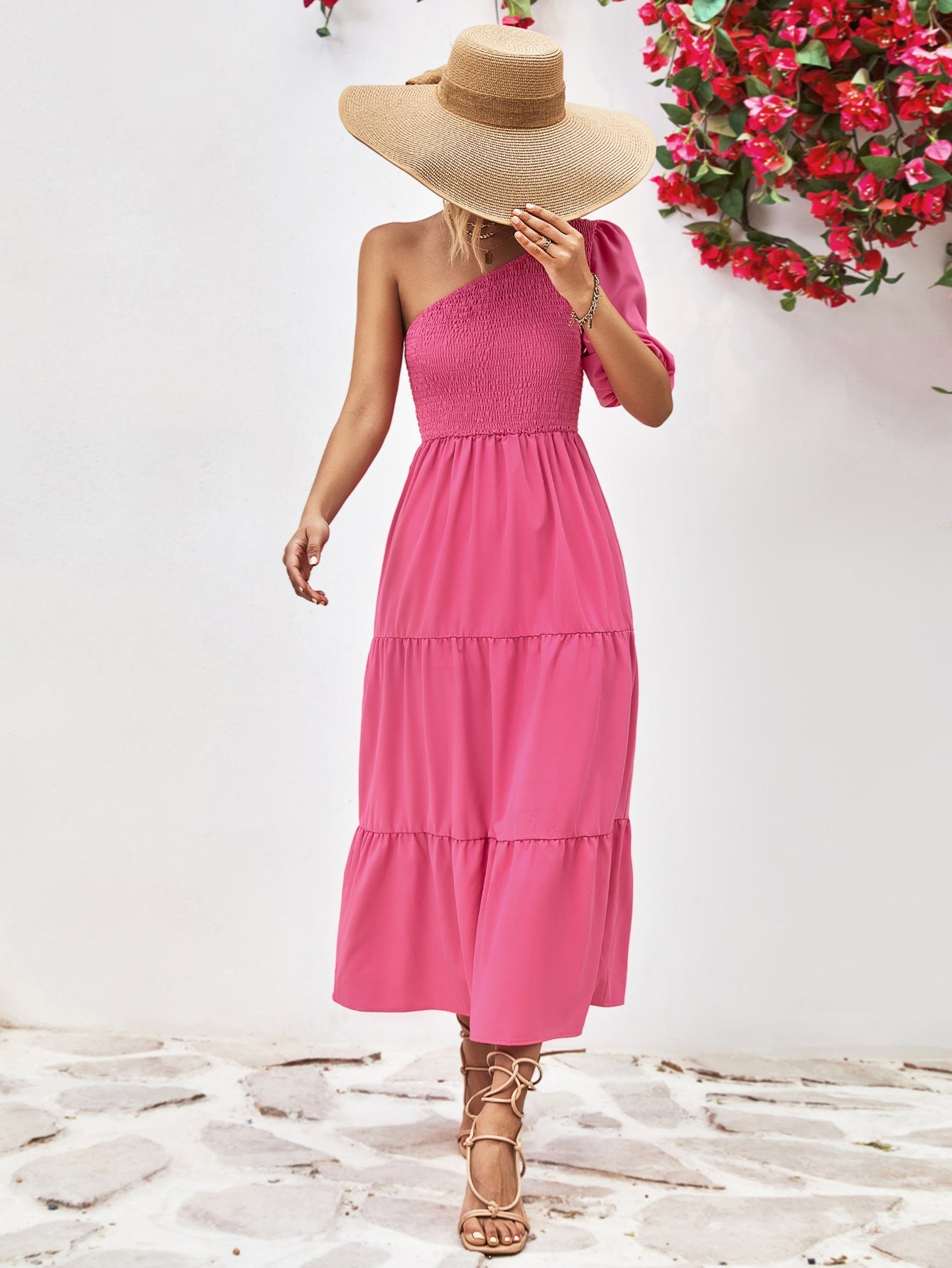 Hot Pink smocked bodice tiered one-shoulder midi dress with puff sleeve.