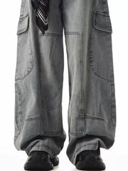 Relaxed fit grey cargo jeans with spacious pockets and a black bandana detail.