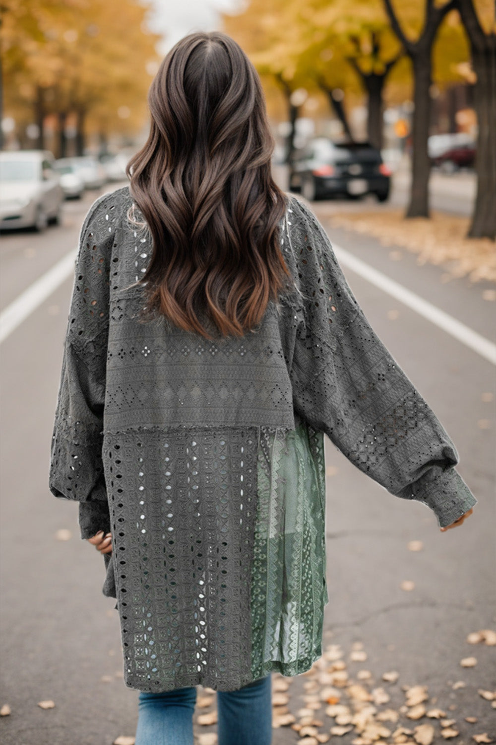 Charcoal lace panel shacket with voluminous sleeves and eyelet details.