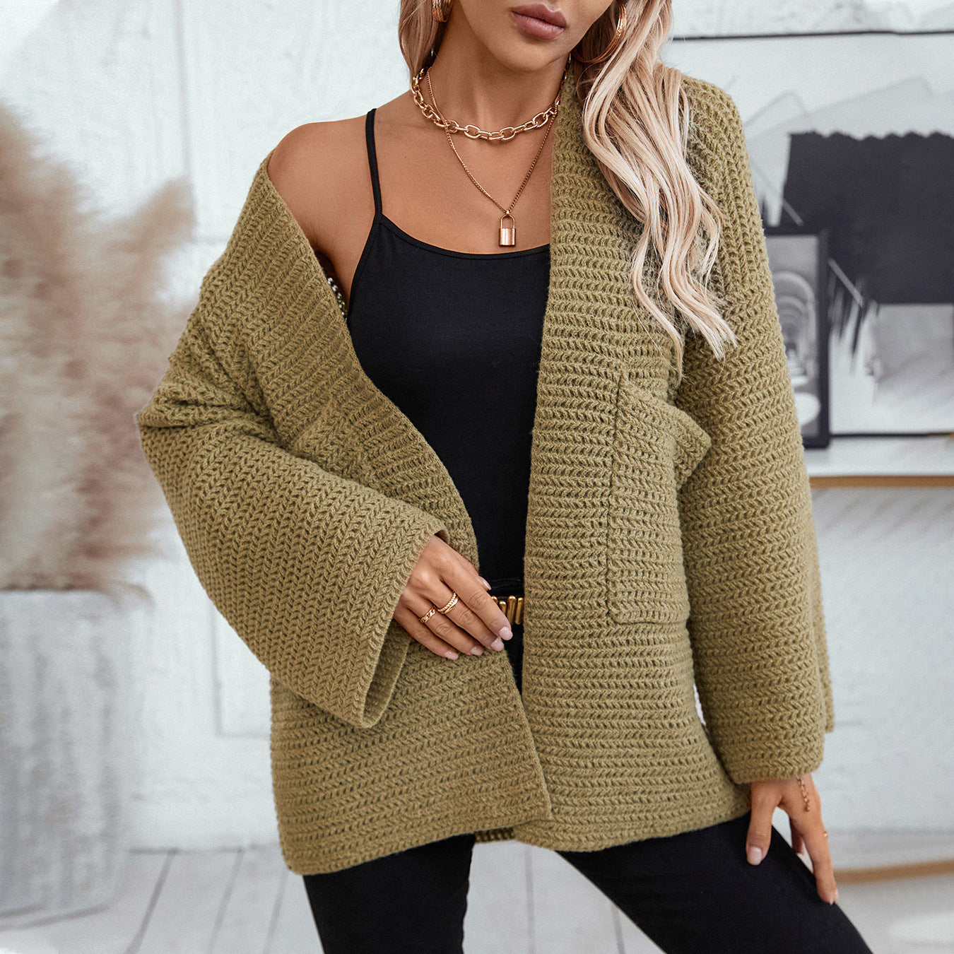 Chunky knit open front cardigan in moss with wide sleeves and a relaxed fit.