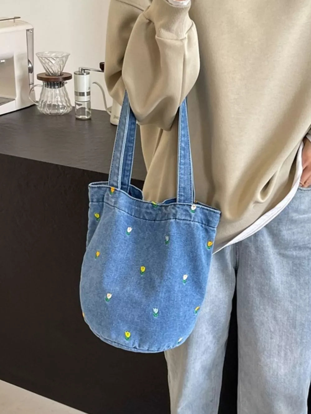 Denim tote bag with embroidered white and yellow tulips, double straps.