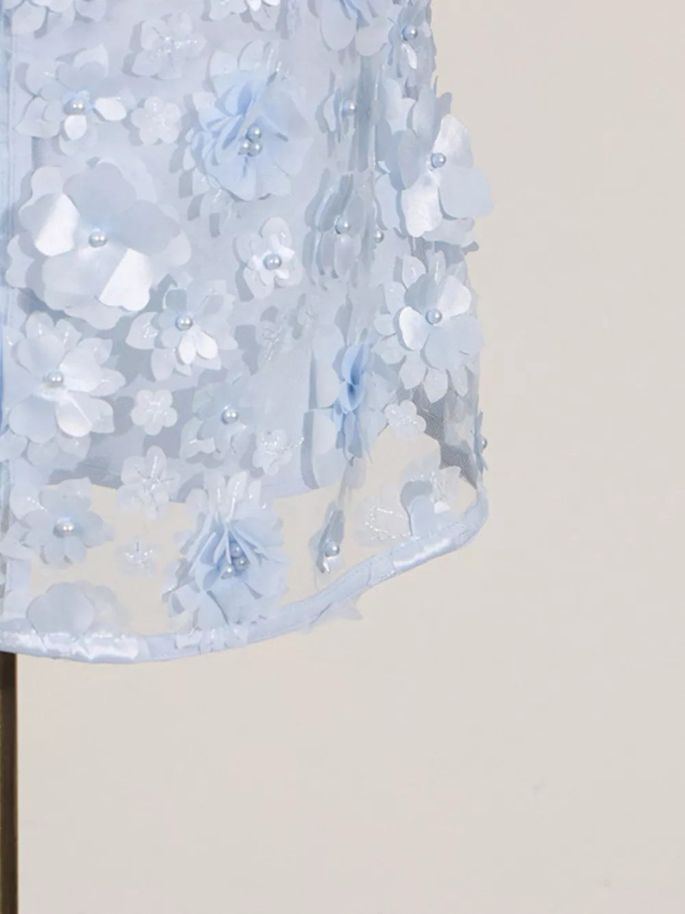Blue mini dress with floral appliques and pearl details