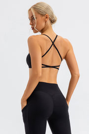 Black crisscross back sports bra with strappy detail and a comfortable fit.